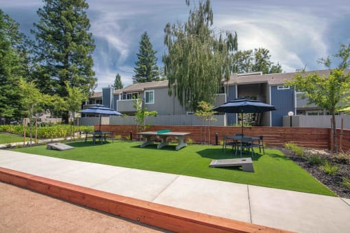 Resident courtyard with outdoor games and furniture