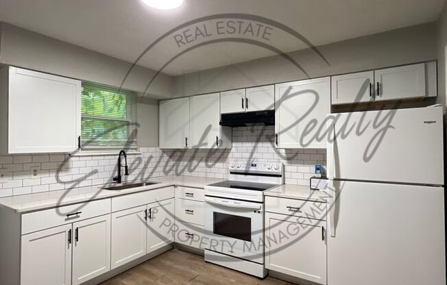 Renovated Two Bedroom Ranch Duplex in Village By the Creek!