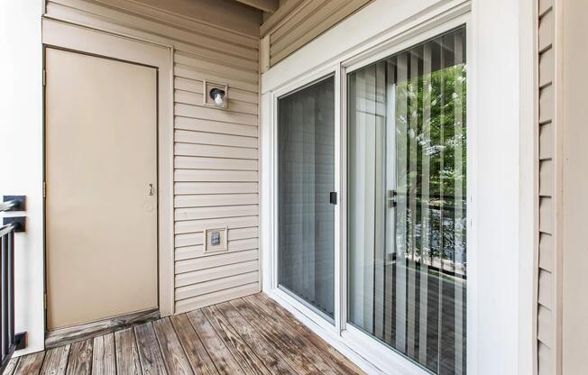 a close up of a doorway in front of a window