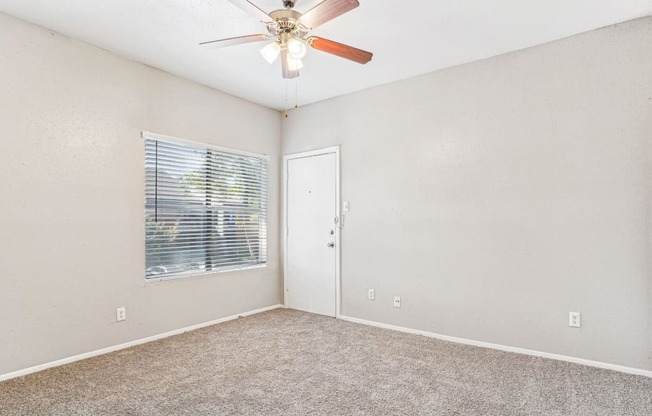 Large bedroom with carpet floor at Laurels of Sendera apartments in Arlington, TX