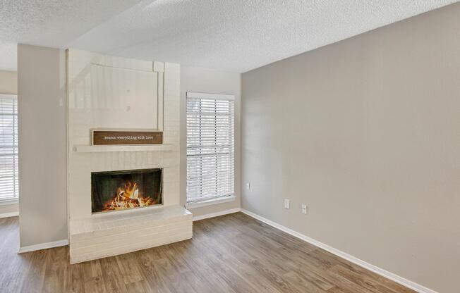 a room filled with furniture and a fireplace