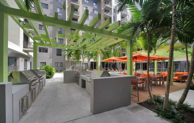 Outdoor Grill With Intimate Seating Area at Berkshire Coral Gables, Miami, FL