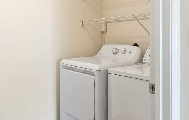 Orchards Apartments Marlborough ma apartment loft style apartments photo of  laundry room with full size washing machine and dryer with storage shelves