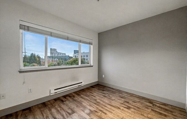 AVAILABLE NOW! Beautiful Queen Anne Condo with Puget Sound Views & Secure Parking!