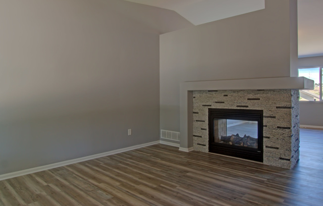 Evolve Real Estate: Complete Remodel with Generous Lush Yard Available August 1, 2025! Finished Basement!