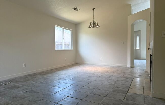 Available Now!!! With fresh paint and new tile flooring throughout!!