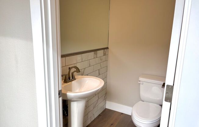 St. Johns Modern Build with Fenced Backyard, Attached Garage, Fireplace + A/C