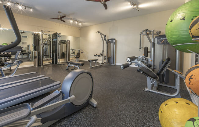 Cardio and yoga equipment in fitness center at Terraces at Clearwater Beach, Clearwater, 33756