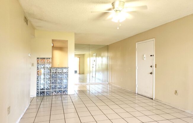 Ground Floor Unit; Lake Front View; All-Tile Flooring; Pool/Tennis/Laundry