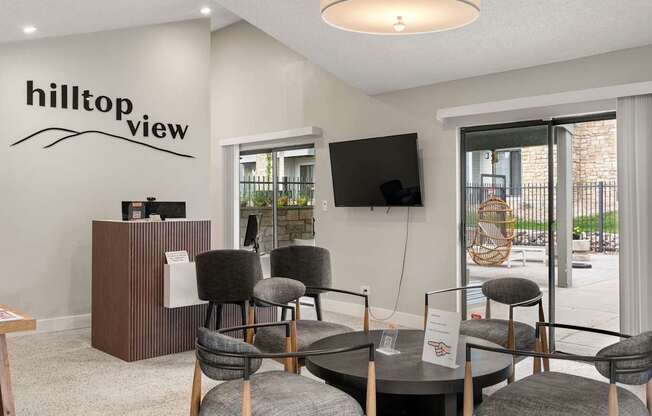 A reception area with a sign that says Hilltop View.