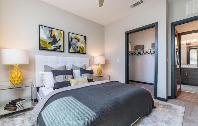 a bedroom with a bed and a closet