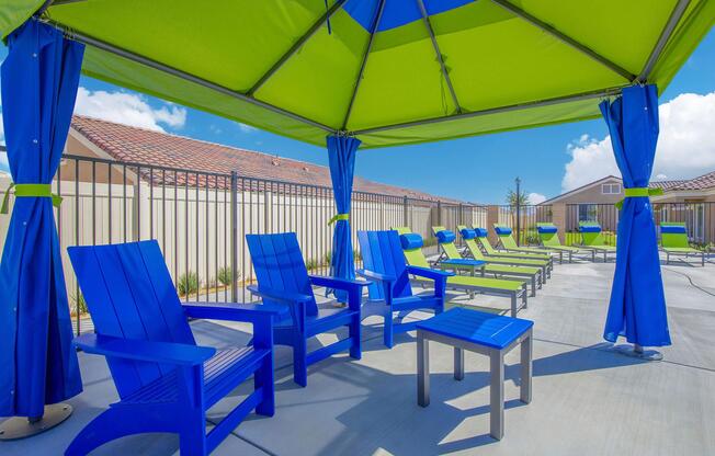 a table topped with a blue umbrella