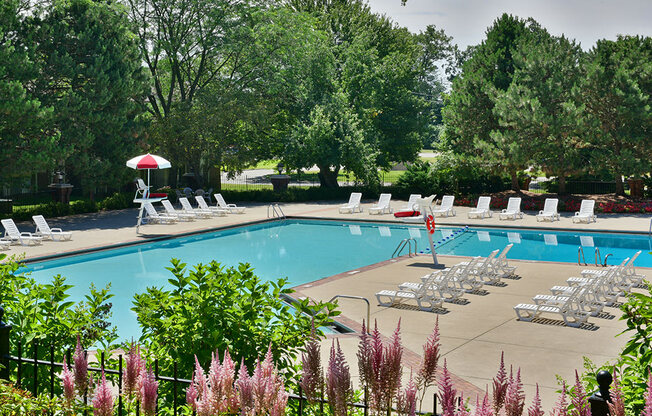 Scenic Pool Surroundings at The Village Apartments, Michigan