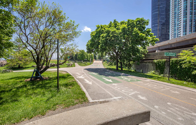 a bike path in a park next to a road at North Harbor Tower, IL 60601