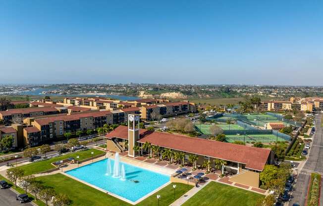 an aerial view of the resort with a swimming pool