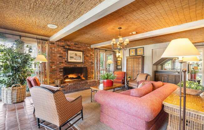 A living room with a fireplace and a couch.