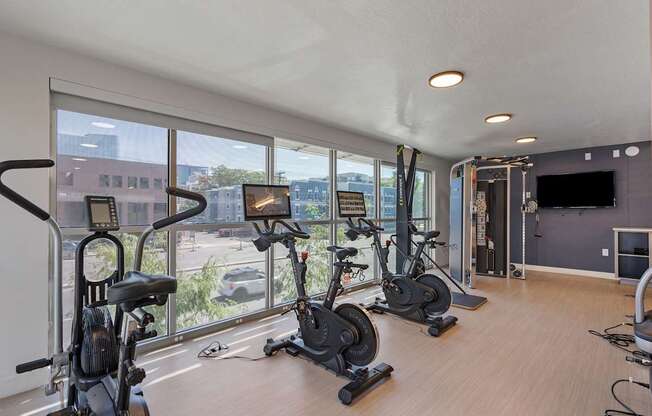 the gym at the preserve at polo terrace apartments