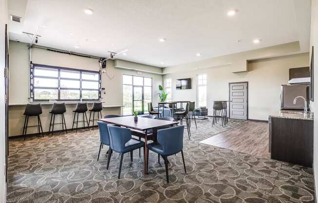 Community room with a table and chairs