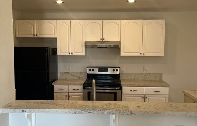 Beautiful 2 Bedroom/1 Bath Floor Level Remodeled Townhome with Two Patios! $2,575.00