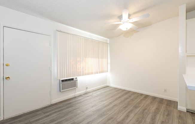 Dining Room with Hardwood Floors and Fan