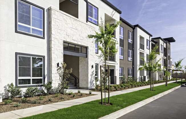 Exterior Photo of The Row Apartment Homes with Landscaping