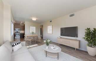 a living room with a couch and a table and a television