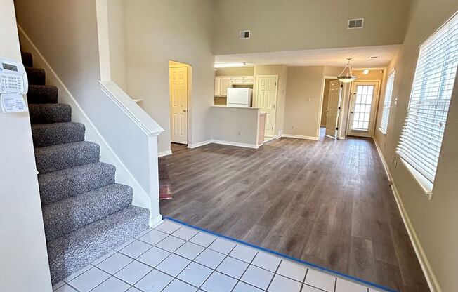 3BD/2.5BA Townhome with fully fenced back yard! Newer Paint! Newer Flooring!