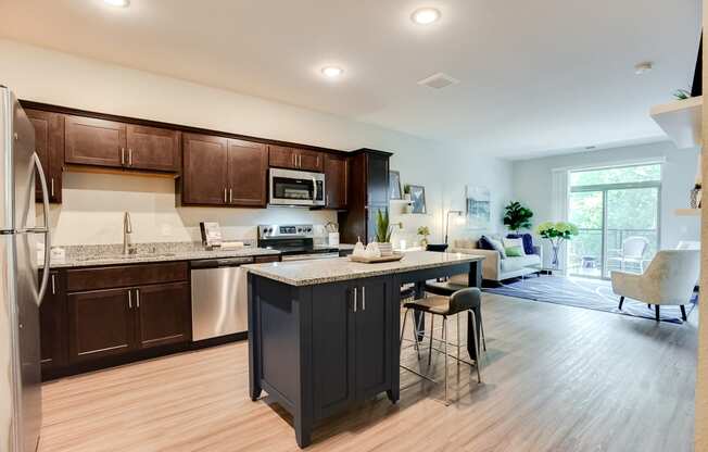 beautiful kitchen with granite and stainless steel appliances at Lake Jonathan Flats, Chaska, 55318