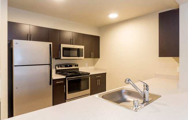 Fully Equipped Kitchen with Refrigerator, Microwave, Dishwasher & USB outlet