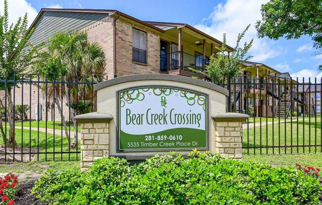 bear creek crossing apartments community sign