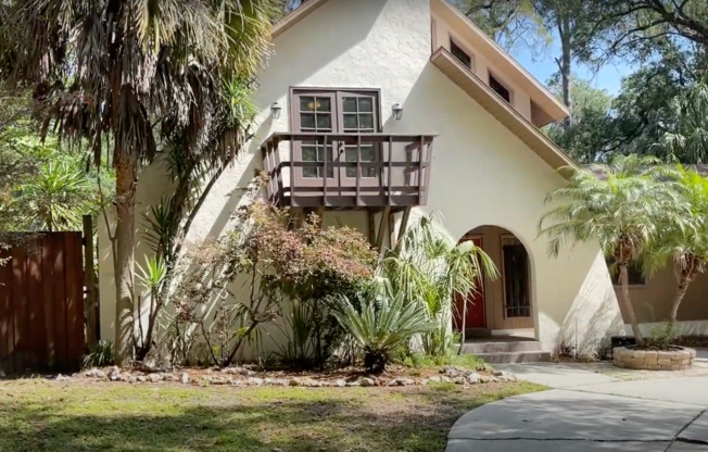 4/2.5 (Buckingham South) This Spanish-style home is a hidden gem, nestled away off of Newberry Rd, offering convenience and privacy all in one.