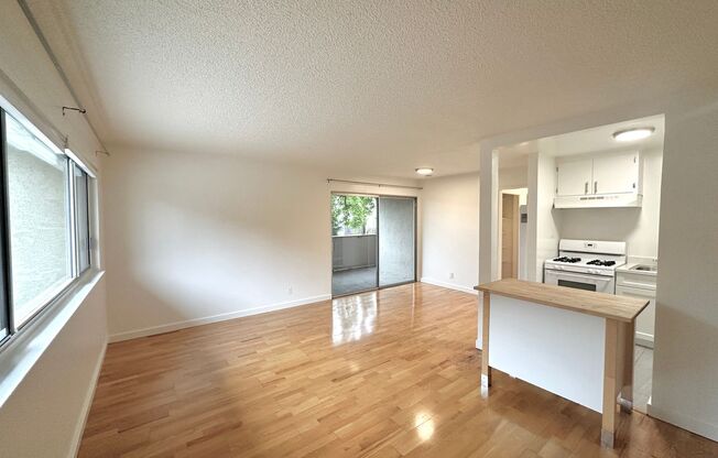 Spacious and Sunlit 2-Bedroom 1-Bath apartment with hardwood floors, private balcony, near Ashby BART
