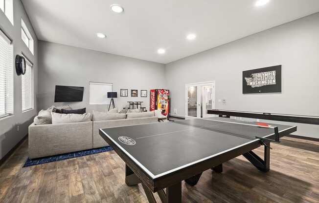 our apartments have a game room with a ping pong table and a flat screen tv at Mill Pond Apartments, Washington, 98092