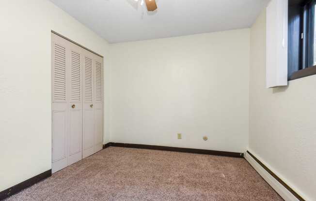 White Bear Lake, MN White Bear Terrace Apartments.  a bedroom with white walls and carpet