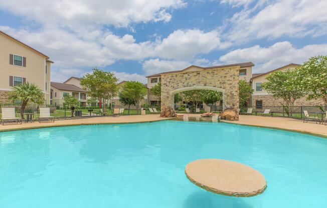 a pool next to a body of water