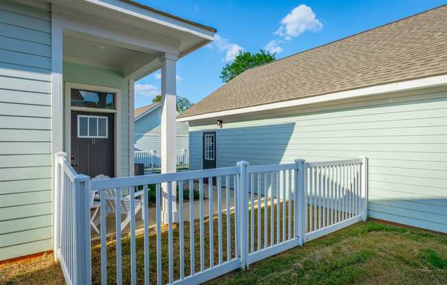 cottage with fenced patio at Anthem Apartments and Cottages in Huntsville, Alabama