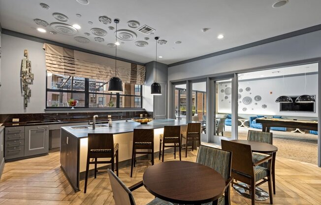 a large kitchen and dining area with a table and chairs