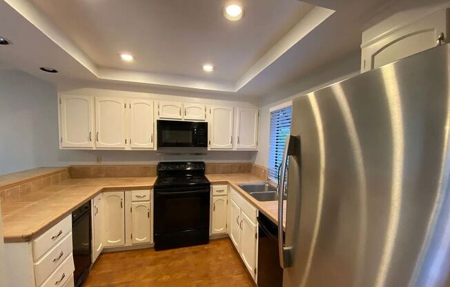 CAMPBELL - Spacious townhome with central A/C, two car attached garage, patio