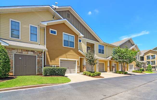a house with a driveway and a street in front of it