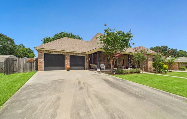 Nestled in the desirable Quail Hollow Subdivision