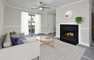 a living room with a fireplace and a couch