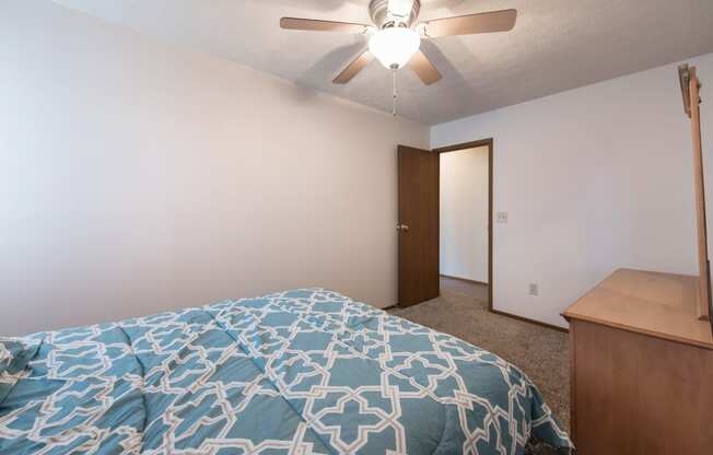 Bedroom With Ceiling Fan at Ashley Village Apartments, Columbus, Ohio