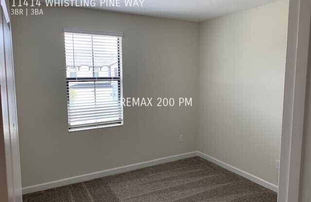11414 WHISTLING PINE WAY