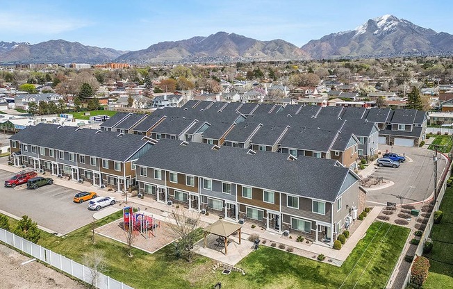A large building with a parking lot in front of it.