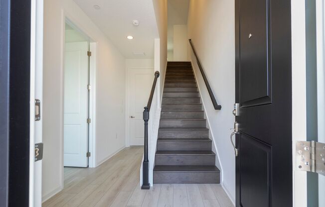 Modern 3-Bedroom 3.5-Bath Townhome with EV Charger, Smart Home Features, 2-Car Garage & Resort-Style Amenities in Lake Nona!