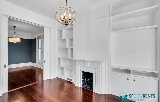 Lower Pacific Heights: Victorian Condo w/ Double Parlor, Shared Yard & EV-Ready Garage Parking