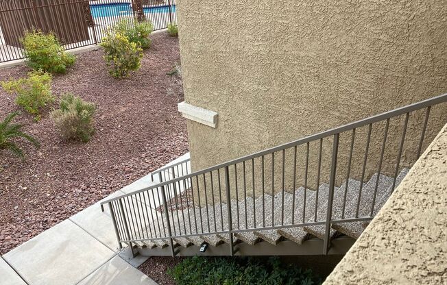 Gated community just minutes south of the strip, 2br/2bath, 2nd floor condo.