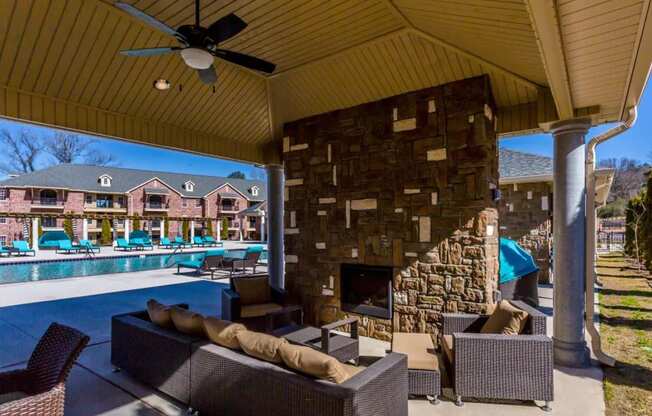 a view of a swimming pool with chairs and a ceiling at Arlo Luxury homes Apartments, Arkansas