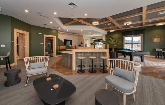 a resident clubhouse with a pool table and bar at The Bend Arbordale, Williamsburg