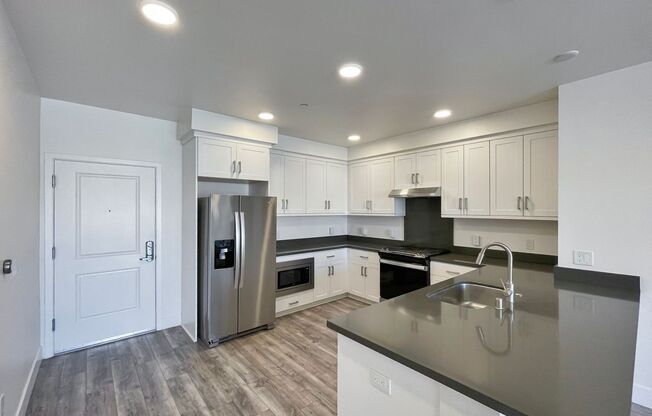 Modern 2BD Fremont Condo – EV Charger, Balcony, & Walk to BART